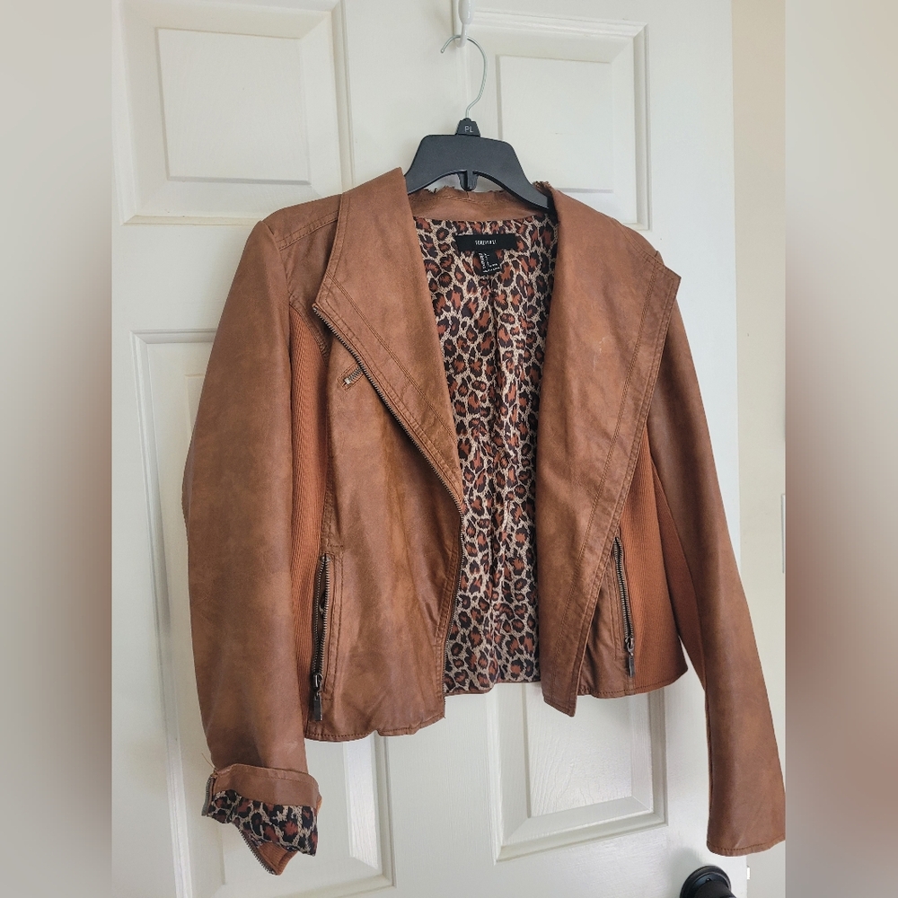 Junior Faux leather jacket. Loved but still has life left. Sfh. Dog friendly.